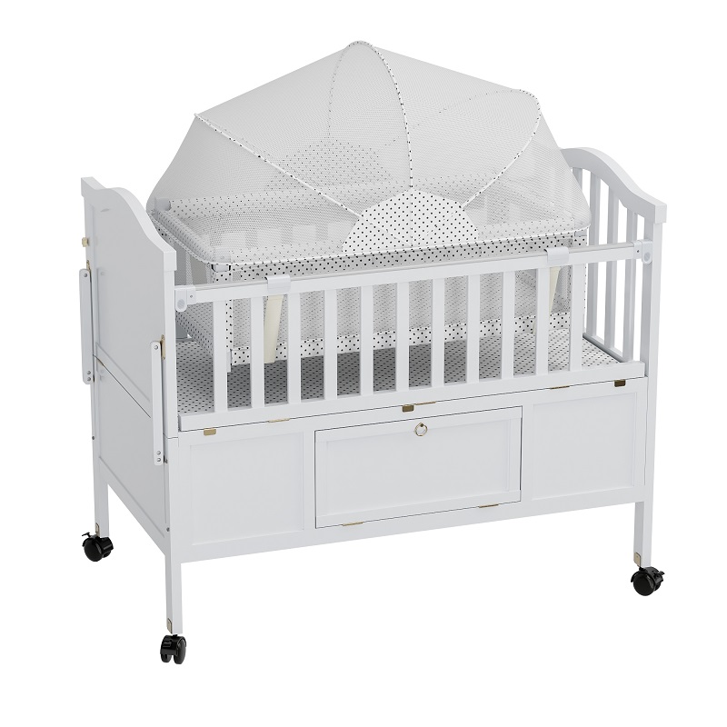 white baby crib with bassinet and storage