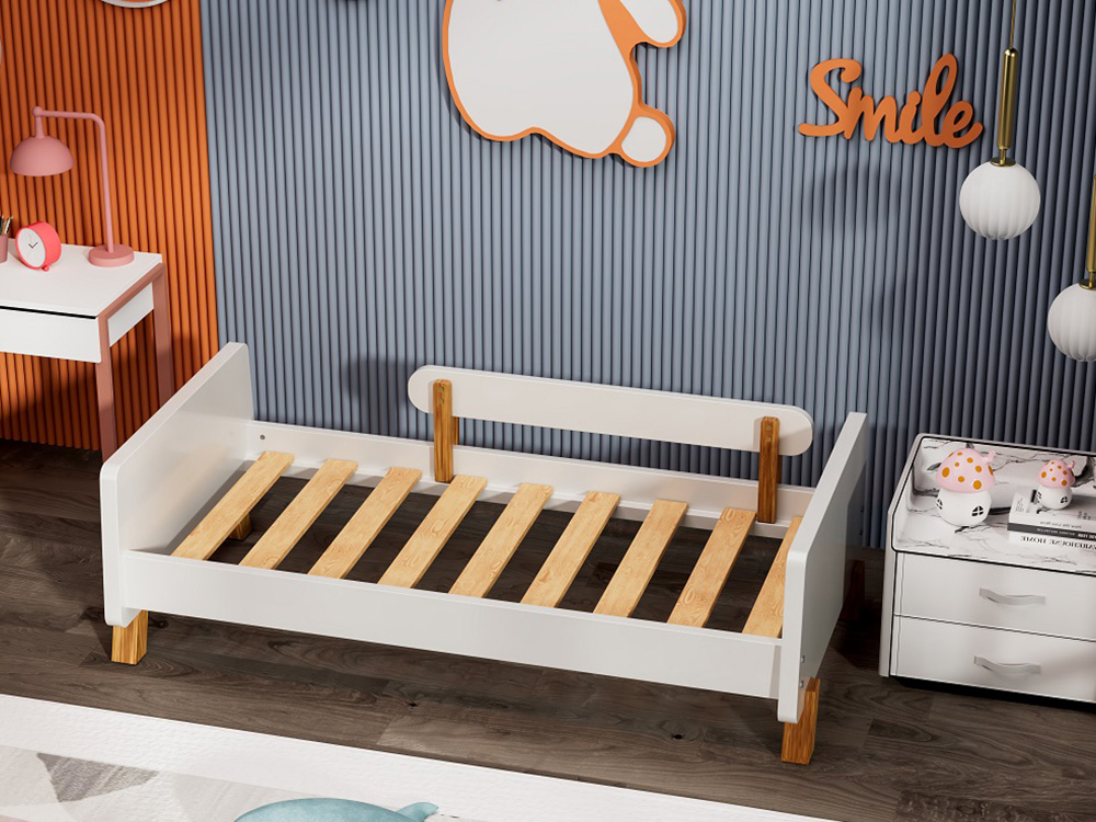 toddler bed frame in the room