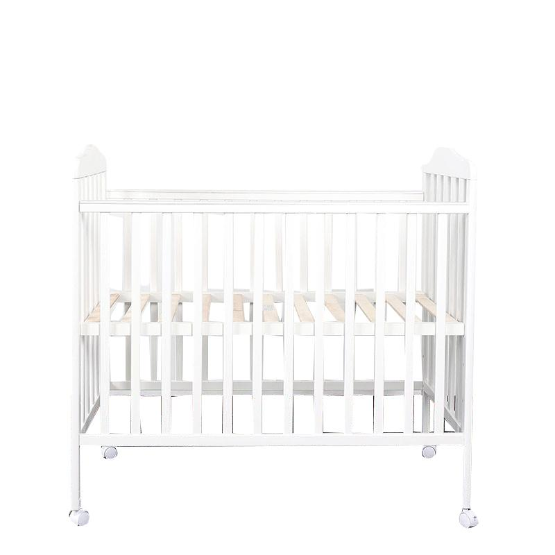 A contemporary White Non-Toxic Baby Wood Crib With Wheels