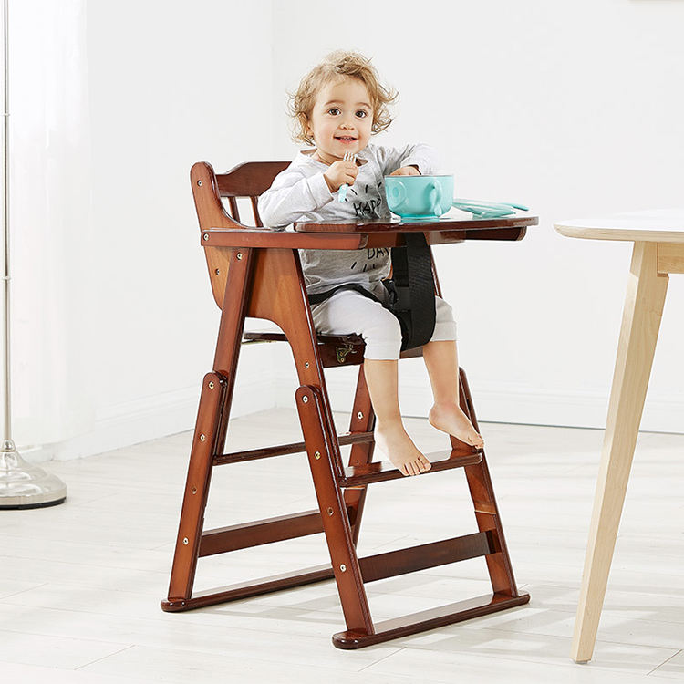 A child sitting in a high chair