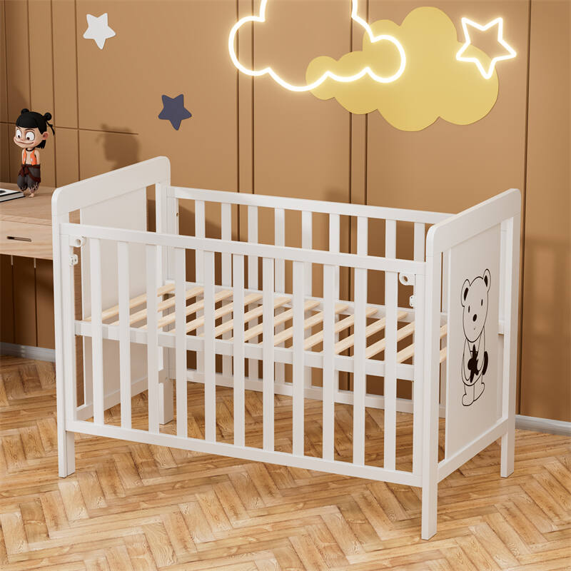 White Wooden Baby Cot with Cartoon Patterns