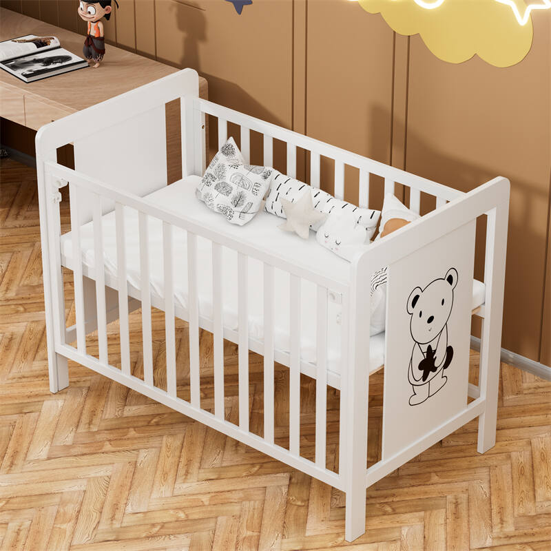 White Wooden Baby Cot with Cartoon Patterns
