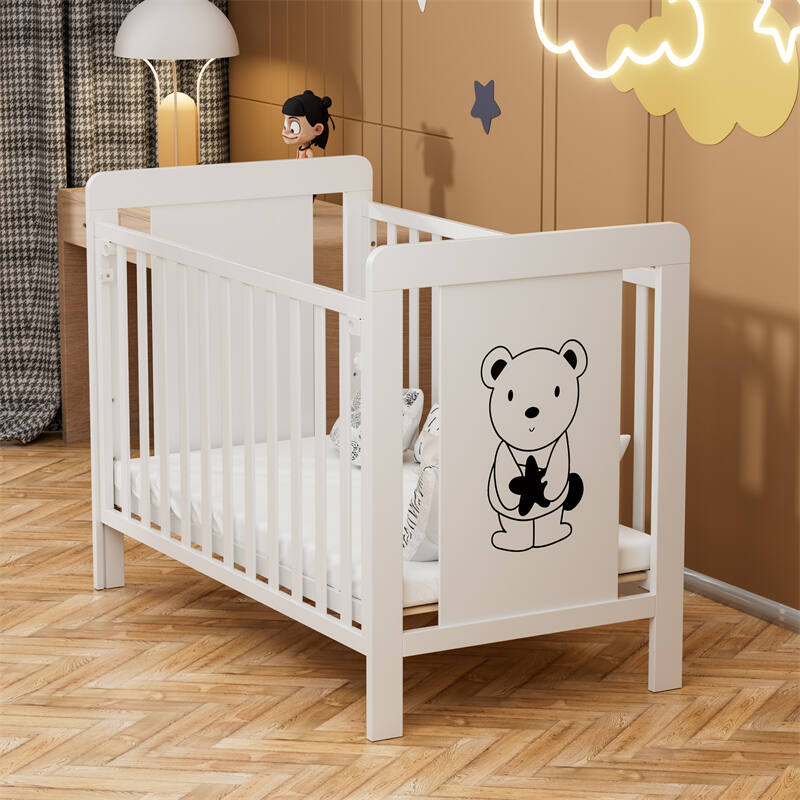 White Wooden Baby Cot with Cartoon Patterns