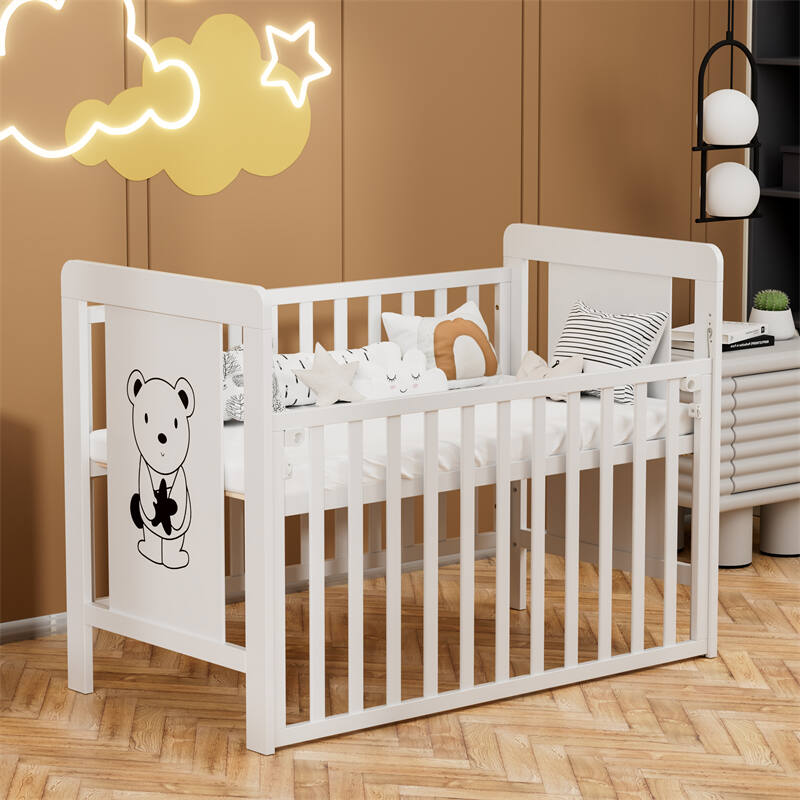 White Wooden Baby Cot with Cartoon Patterns