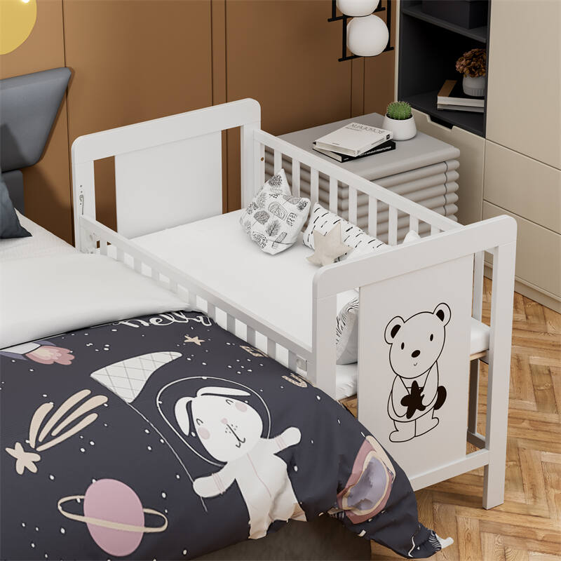 White Wooden Baby Cot with Cartoon Patterns
