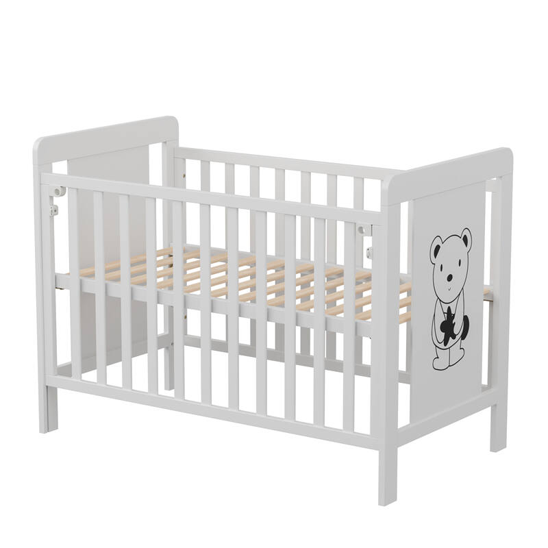White Wooden Baby Cot with Cartoon Patterns